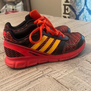 Red, black and orange adidas Size 1